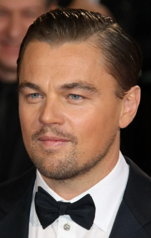 Slicked Back With Side Part – Leonardo DiCaprio Style